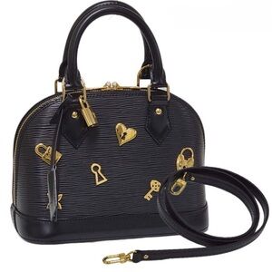 SOLD‼️‼️‼️💯 % auth. RARE !!! LV alma bb Love lock